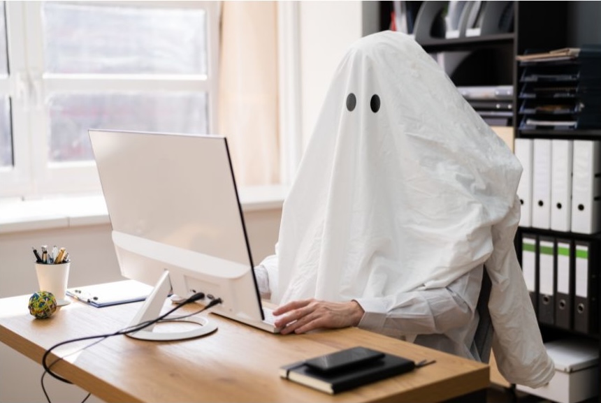 A ghost writing at a laptop. Or a ghost writer. Who knows?